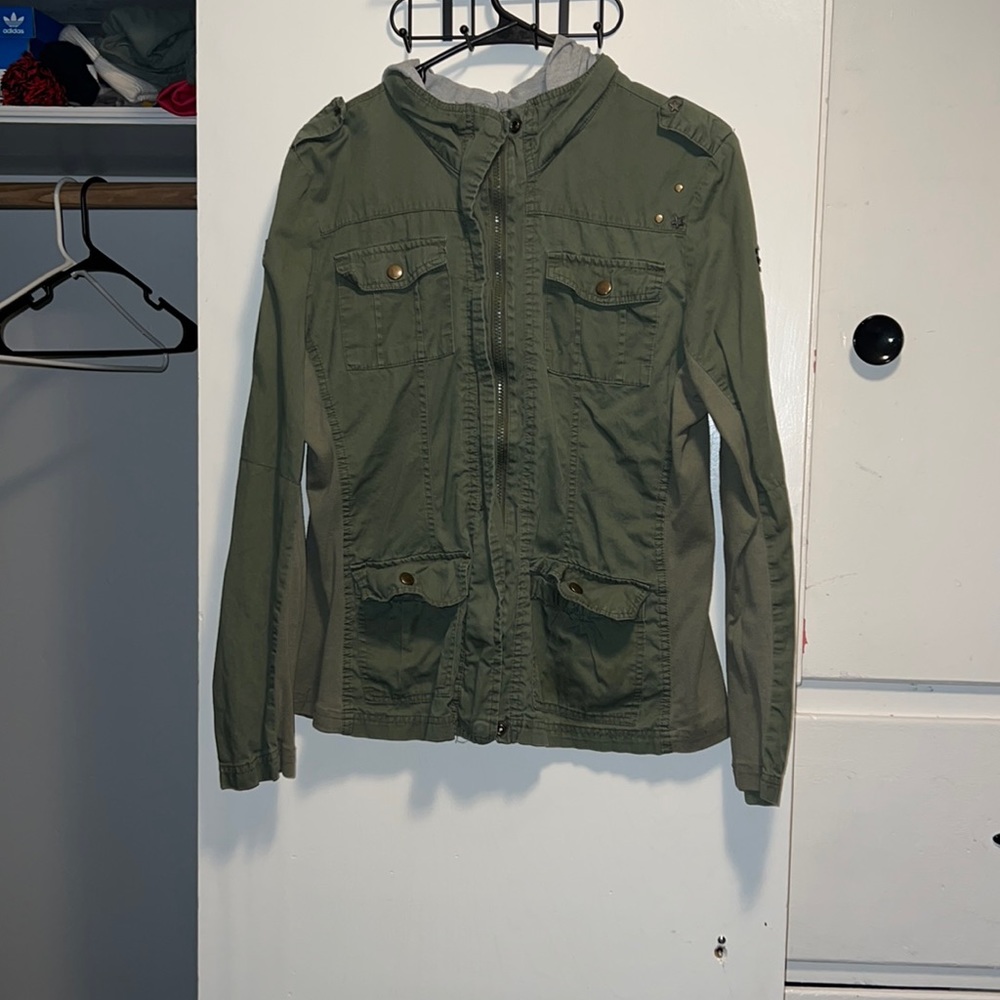 Green army jacket with patches